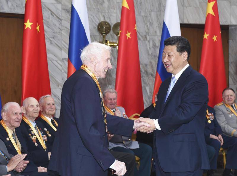 时政微观察丨从三枚勋章展望习主席俄罗斯之行